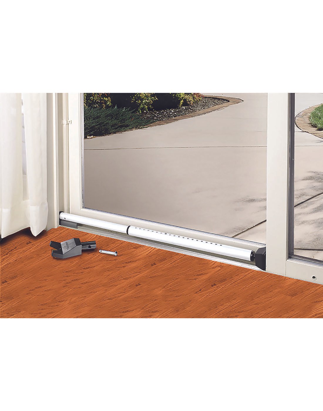 Master Lock Security Bar installed at the bottom of a sliding door