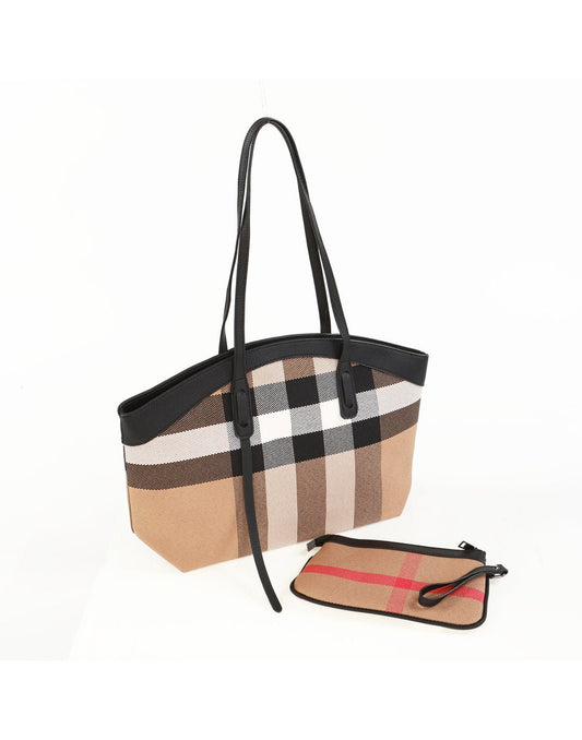 Product Image – Alina's 2pc Rounded Handbag in white, black, tan and red chunky plaid with tan faux leather rounded edging on top and matching double strap. Beside it is a small matching zippered pouch, side angled view.