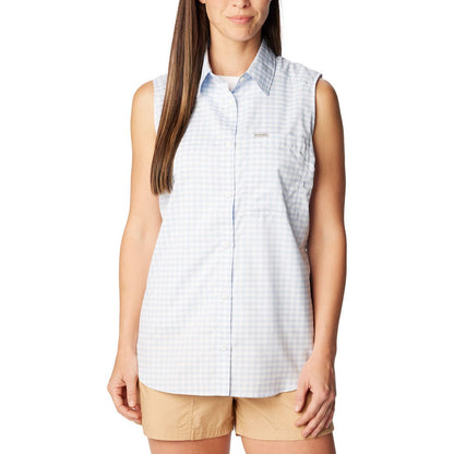 Woman wearing beige shorts and Columbia Women's Anytime™ Lite Sleeveless Top in whisper light blue and white checkered pattern, front view