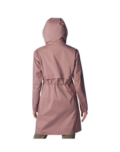 Woman wearing Columbia Women's Weekend Adventure™ Long Shell Jacket in fig, hood up, back view