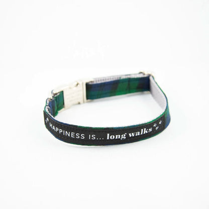 Happiness Is... Long Walks Blackwatch Dog Collar with silver clip.  Blue and green plaid fabric with black strip with white small paw prints and words that say Happiness Is...long walks.