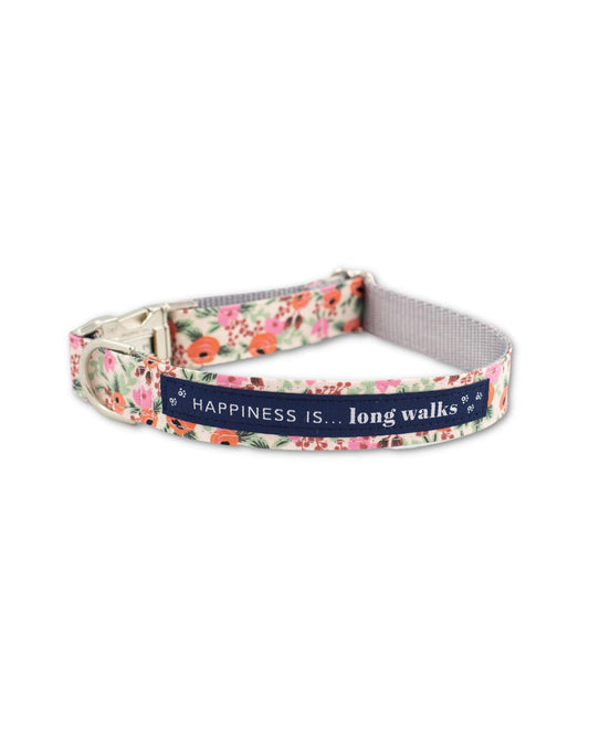 Product Image – Happiness Is... Long Walks Floral Dog Collar with silver clip and navy blue strip with white small paw prints and words that say Happiness Is...long walks