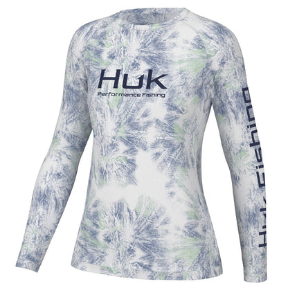 Front view of the Huk Women's Pursuit Performance Shirt in Aqua Dye White colour. Huk logo printed across chest and "Huk Fishing" along outside length of left sleeve.