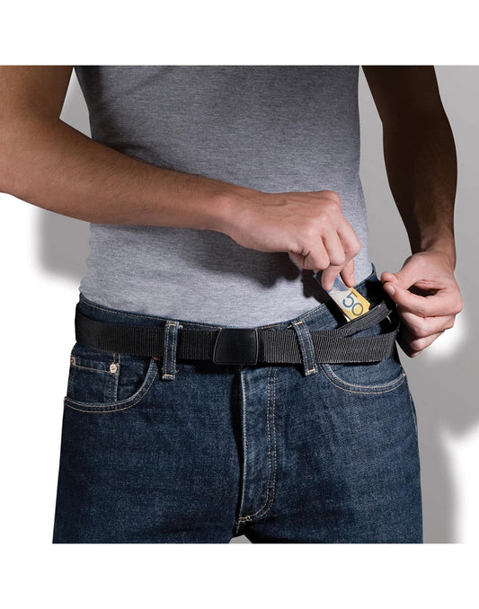 Product Image – Close up of man's torso wearing grey t-shirt, blue jeans, and Pacsafe Cashsafe Anti-Theft Travel Wallet Belt, putting cash into the secret pocket