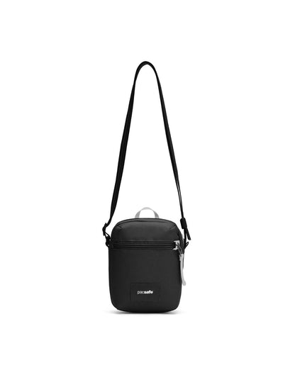 Pacsafe® GO Anti-Theft Micro Crossbody in jet black colour, front view with cut-resistant strap extended.