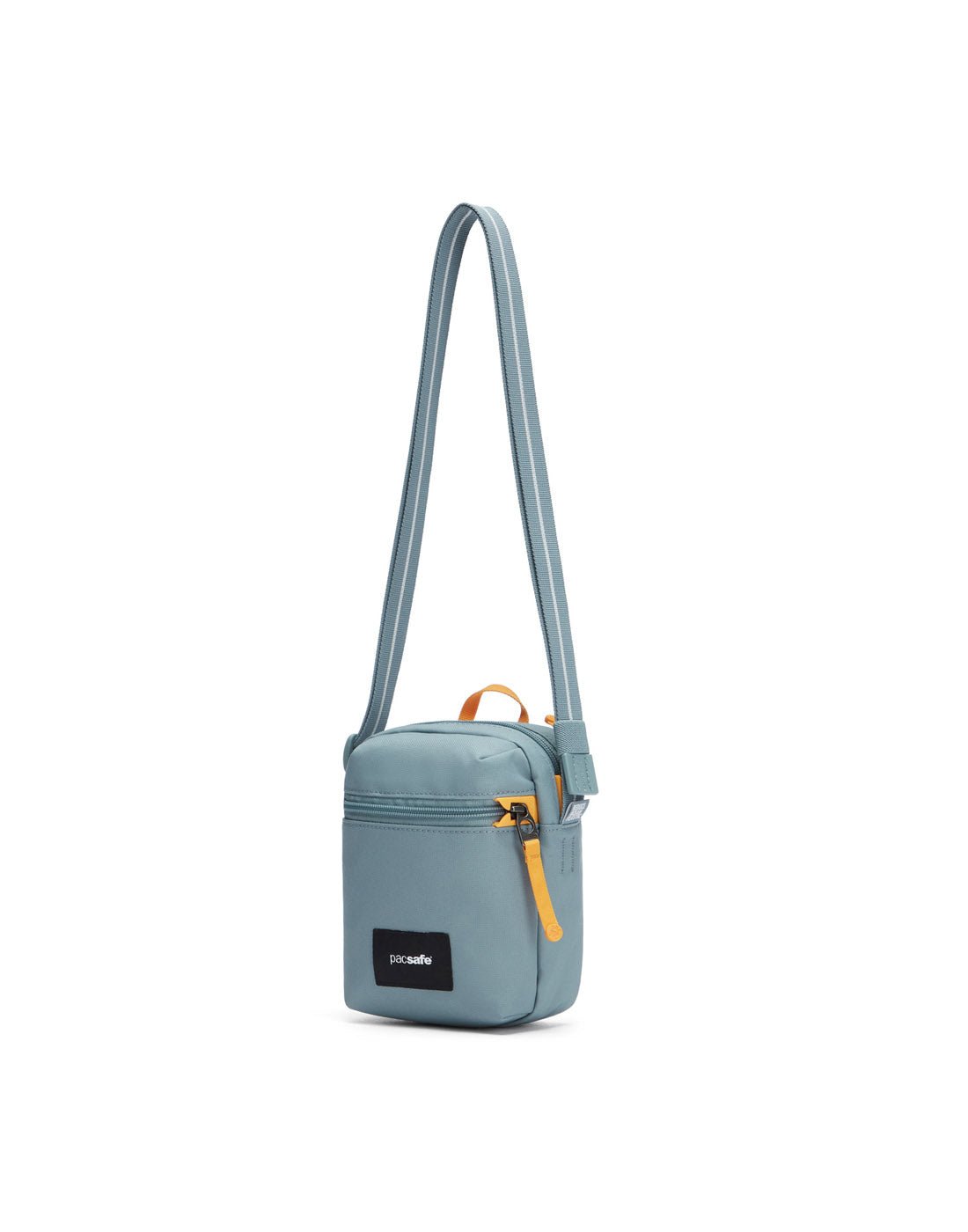 Pacsafe® GO Anti-Theft Micro Crossbody in mint green colour, front right side view with cut-resistant strap extended.