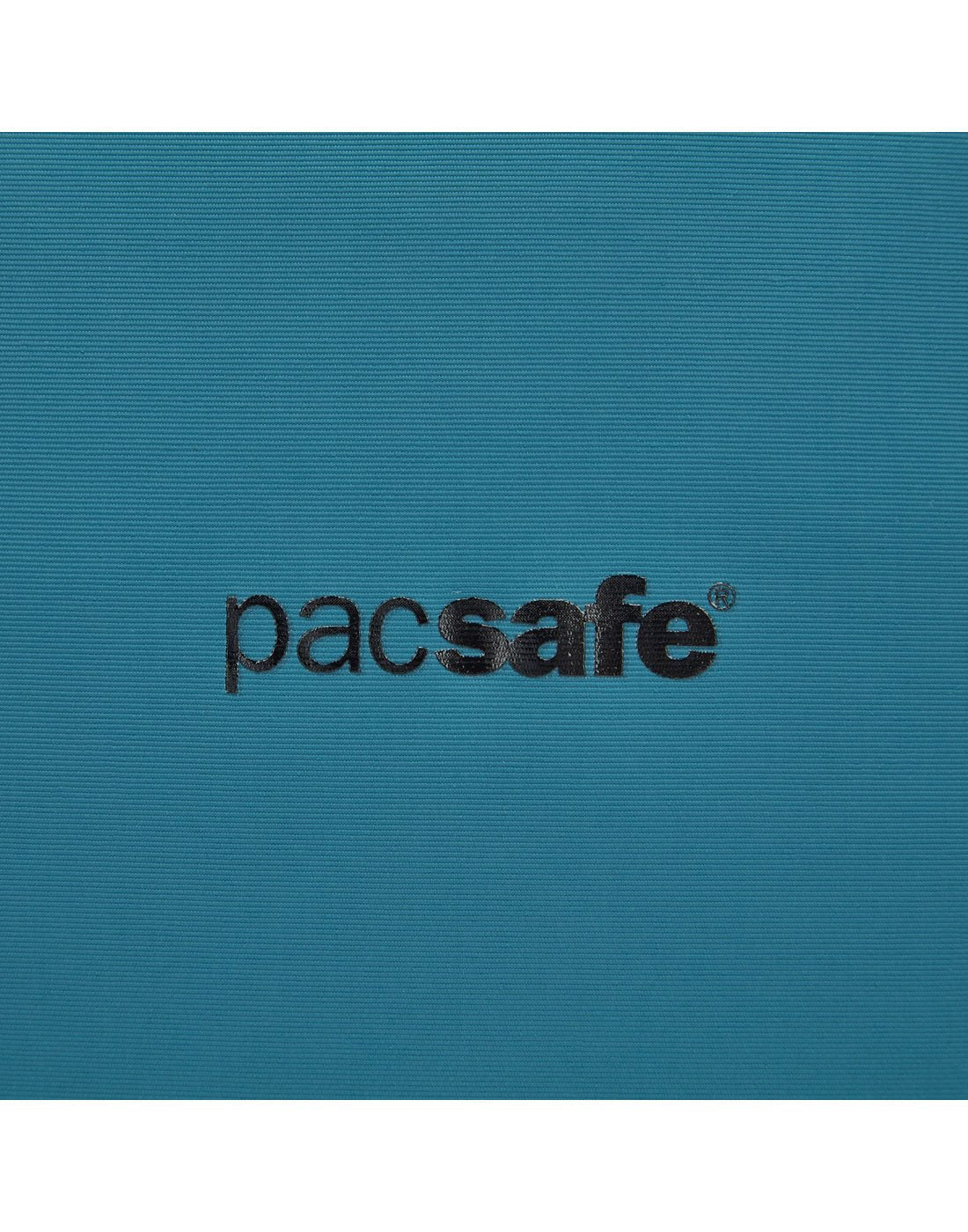 Close up of black Pacsafe logo on tidal teal backpack