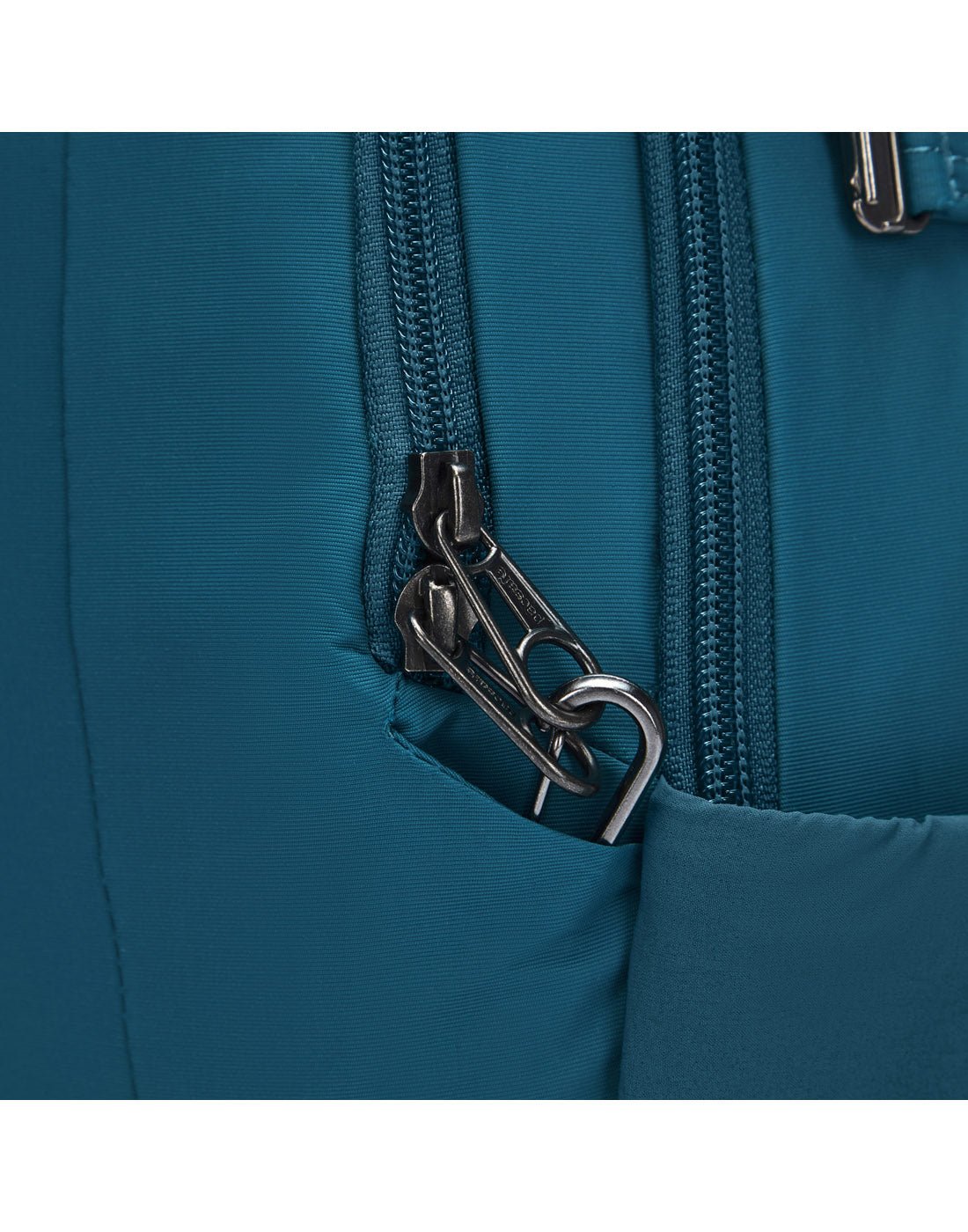 Close up of lockable zipper pulls on tidal teal backpack