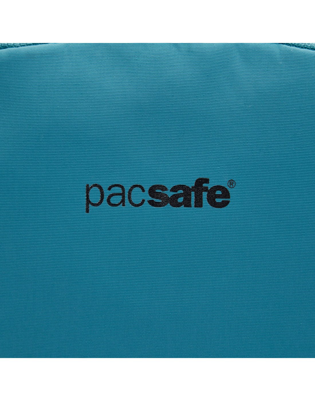 Close up of Pacsafe logo in black on the tidal teal backpack