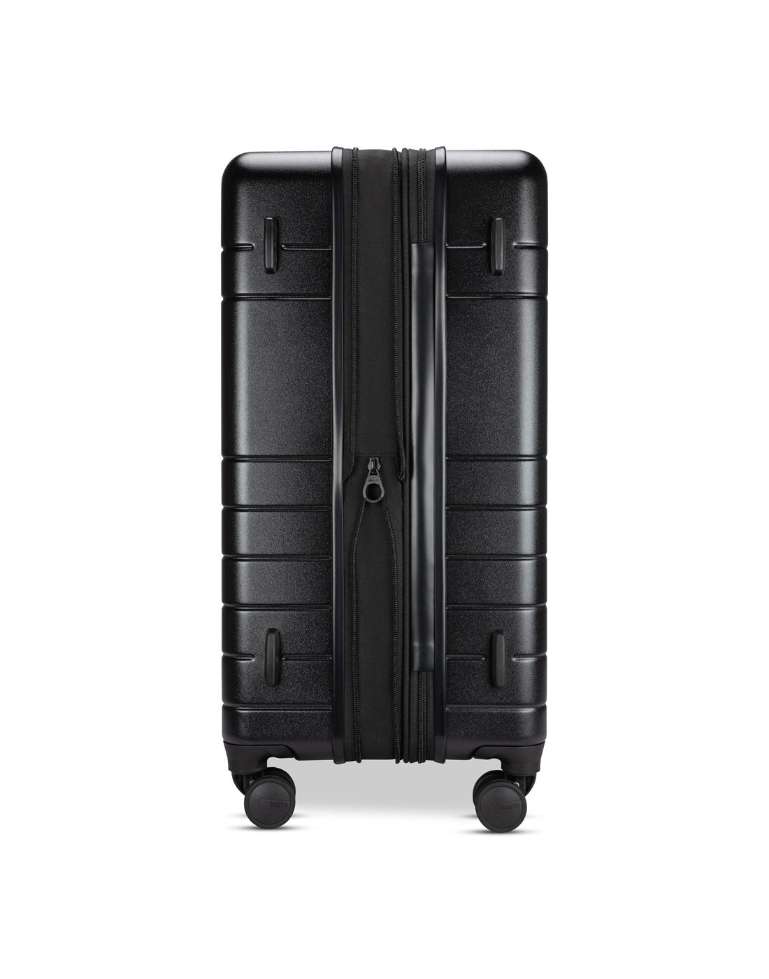 Roots Travel 24" Expandable Hardside Spinner in black, expanded side view.