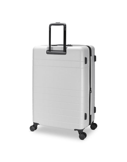 Roots Travel 28" Expandable Hardside Spinner in antarctica, back angle view with handle extended out.