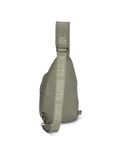 Roots Travel Sling Bag in sage, back view.