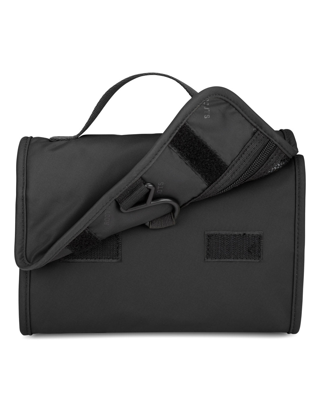 Roots Travel Toiletry Bag in black, close-up view of double velcro closure.