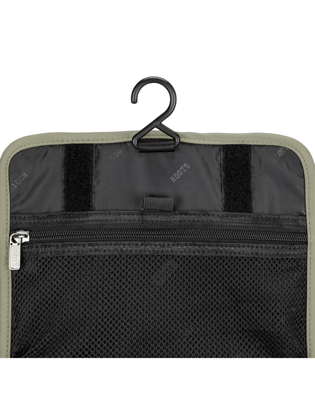 Roots Travel Toiletry Bag in sage, close-up view of mesh pocket and hook.