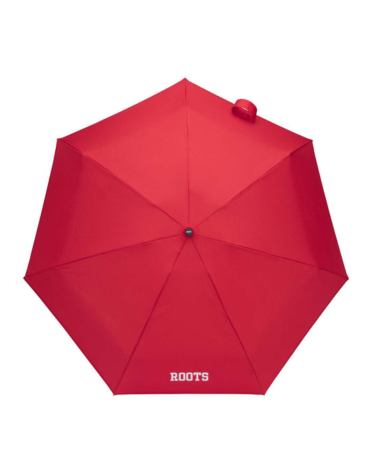 Product Image – Roots Ultra Light Mini Umbrella, red, open top view with white Roots name logo on one panel