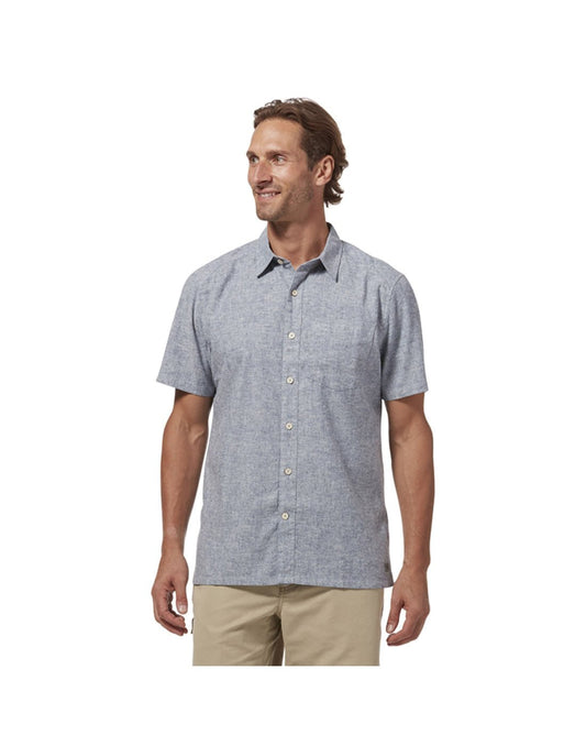 Product Image – Top half of man wearing Royal Robbins Men's Hempline Short Sleeve in Sea colour with khaki shorts