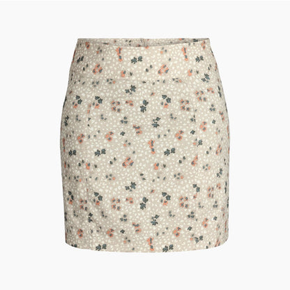 Royal Robbins Women's Discovery III Printed Skort in light khaki colour with small pattern of peach flowers and green leaves, front view