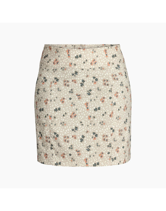 Product Image – Royal Robbins Women's Discovery III Printed Skort in light khaki colour with small pattern of peach flowers and green leaves, front view