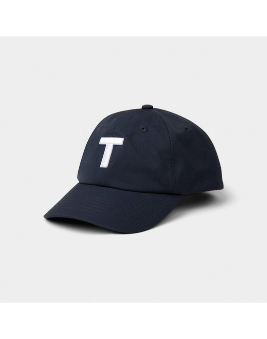 Product Image – Tilley T Golf Cap in dark navy with large white T on front, front angled view