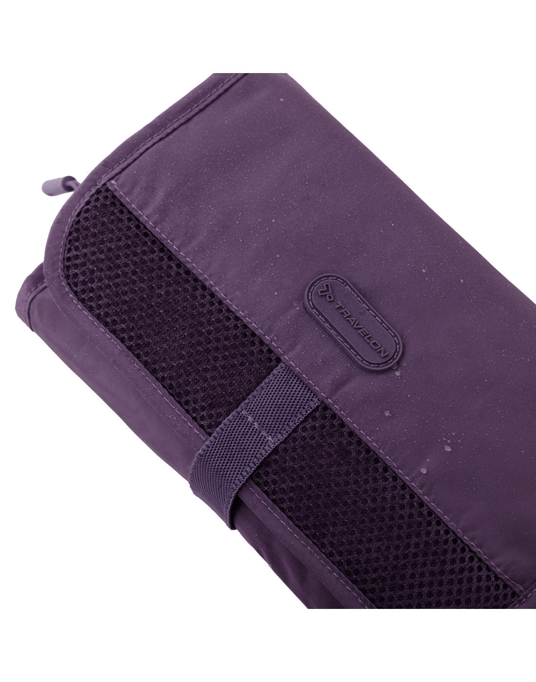 Close up view of Travelon Pi Shine on Toiletry Case in blackberry, positioned at an angle.