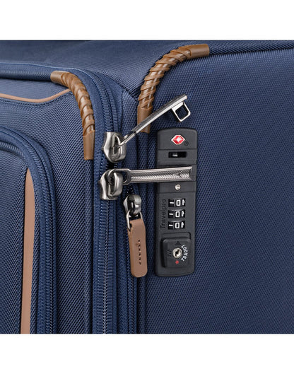 Travelpro Crew™ Classic Large Check-in Expandable Spinner in Patriot Blue. Close-up view of the TSA-approved zipper lock.