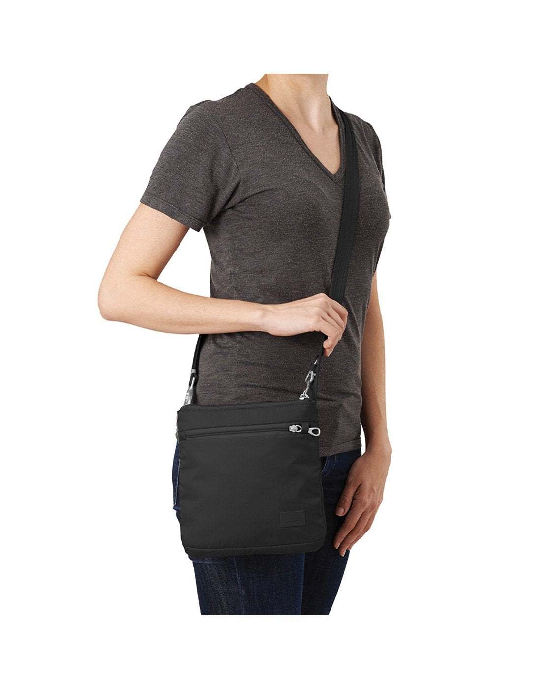 Women carrying pacsafe citysafe cs50 anti-theft crossbody black colour purse front view