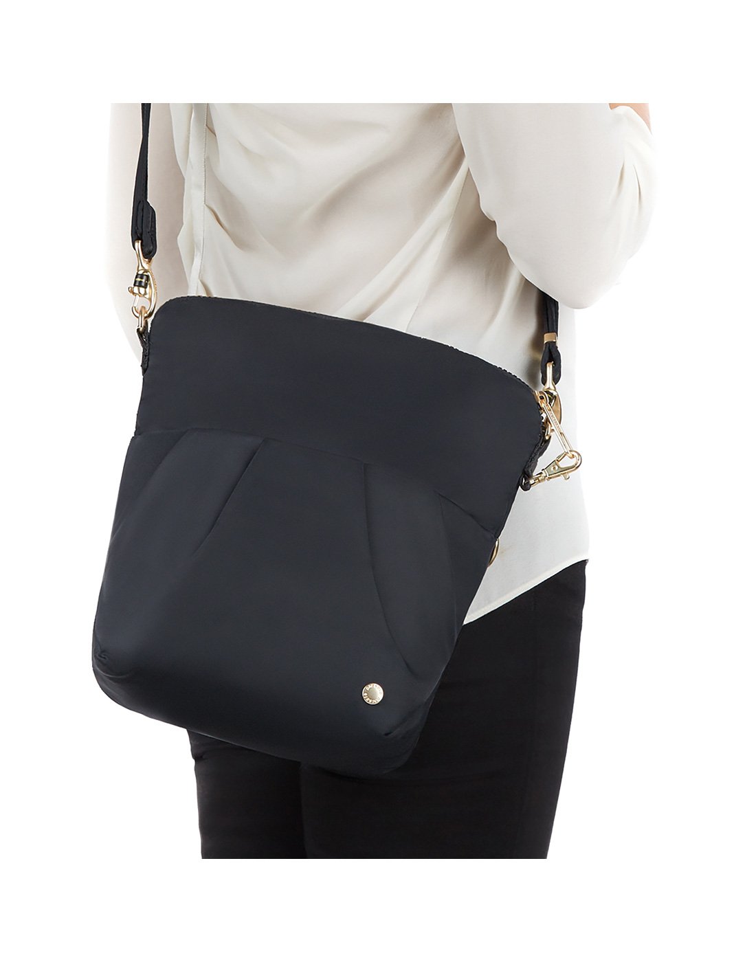 Women carrying citysafe cx convertible anti-theft crossbody black colour handbag front view