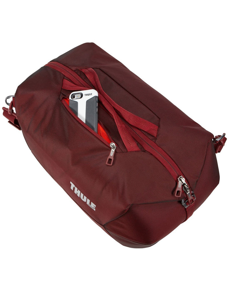 Thule subterra 45L ember colour duffel bag exterior pocket