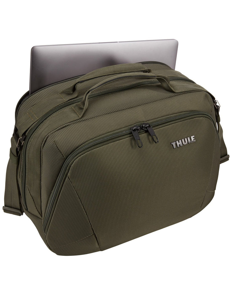 Using thule crossover 2 forest night colour boarding bag back pocket