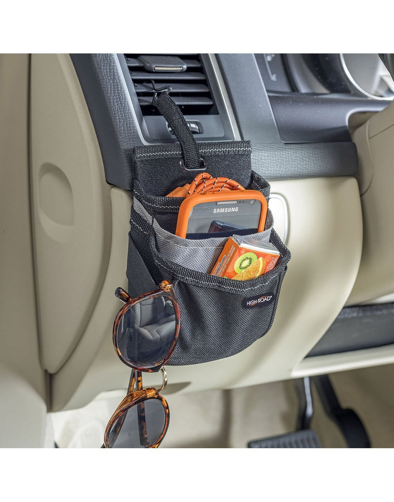 High Road DriverPockets Air Vent Cell Phone Organizer on display in a car hanging off vent