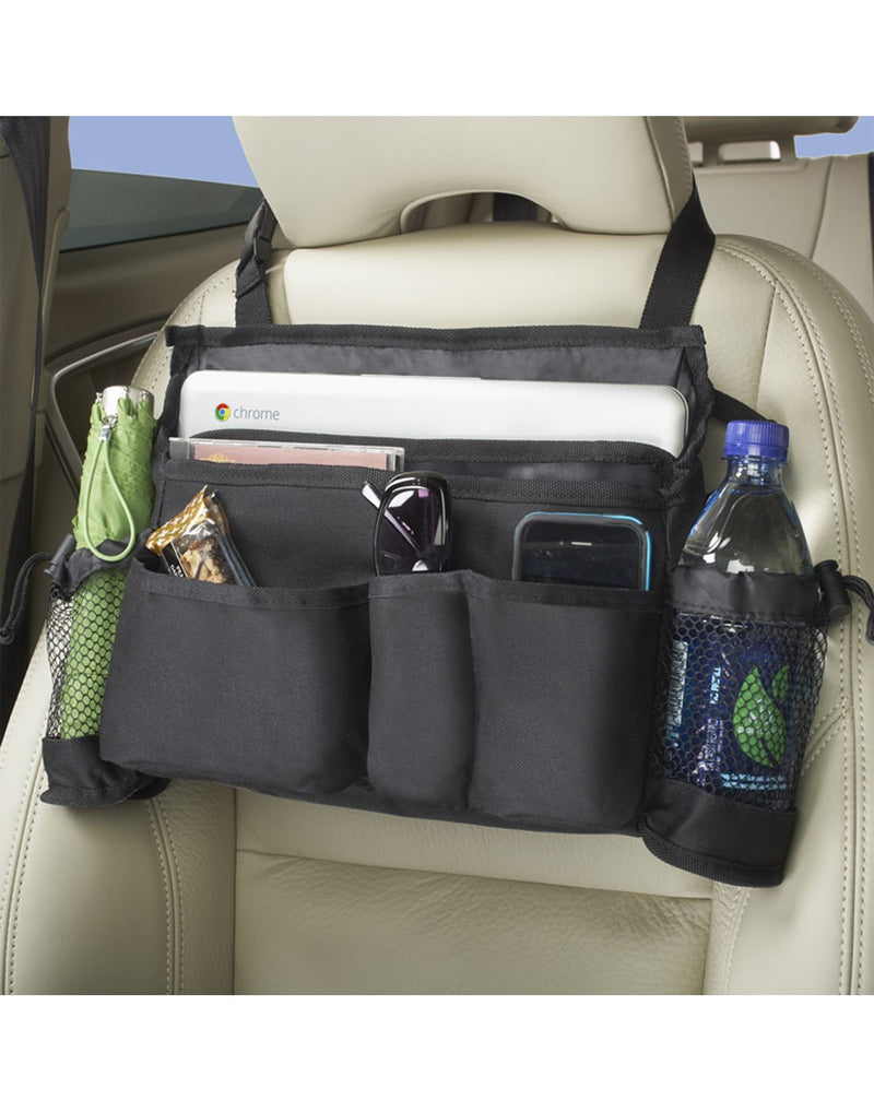 High Road SwingAway Car Seat Organizer on display swung around and hanging from front of head rest in a vehicle - filled with an umbrella, bottle of water, sunglasses, snack, cell phone and tablet