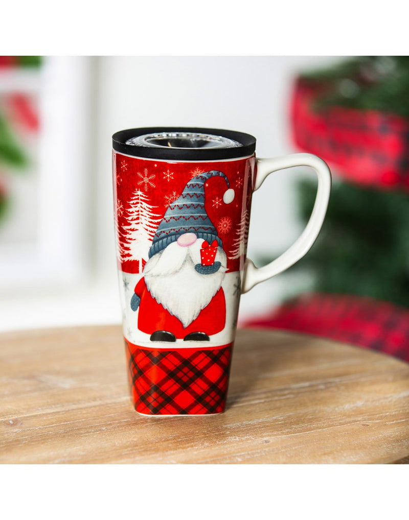 Ceramic FLOMO 360 Travel Cup - 17 oz Winter Gnome design sitting on a wood table