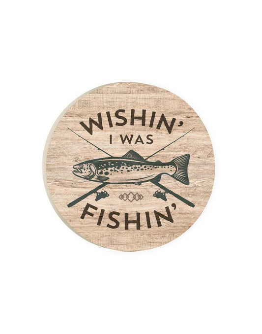 Product Image – Round car coaster with brown wooden background and image of two crossed fishing rods and fish in the middle with words Wishin' I Was Fishin' in brown capital letters