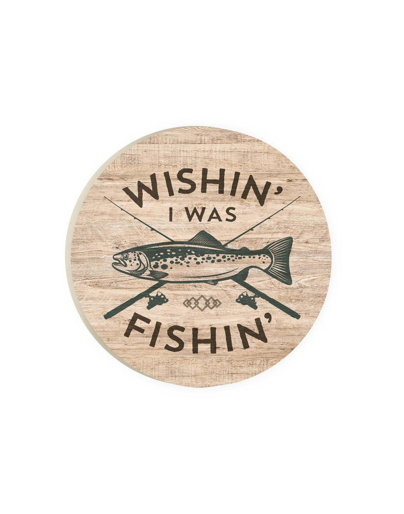 Round car coaster with brown wooden background and image of two crossed fishing rods and fish in the middle with words Wishin' I Was Fishin' in brown capital letters