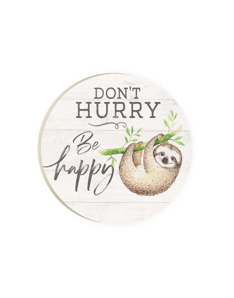 Round car coaster with white wooden slat background and sloth hanging from a green branch with words Don't Hurry Be Happy