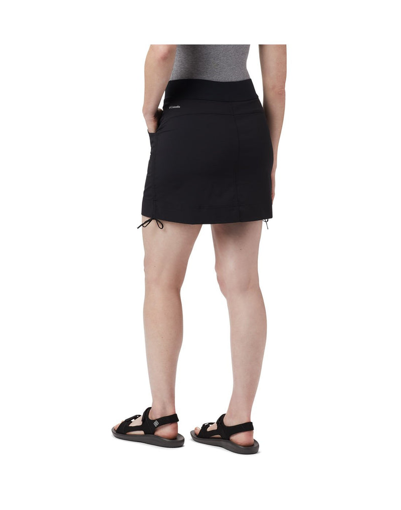 Woman wearing Columbia Women's Anytime Casual™ Skort - black, back view