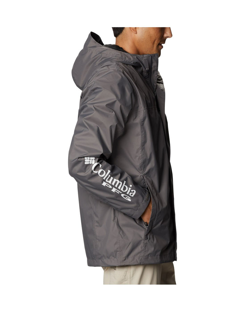 Man wearing Columbia Men's PFG Storm™ Jacket  - city grey, side view