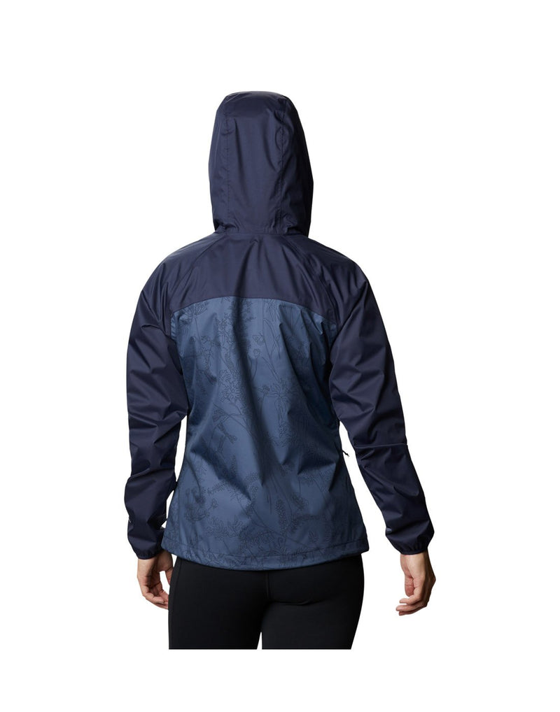 Model wearing Columbia Women's Ulica™ Jacket - nocturnal blue, back view with hood up