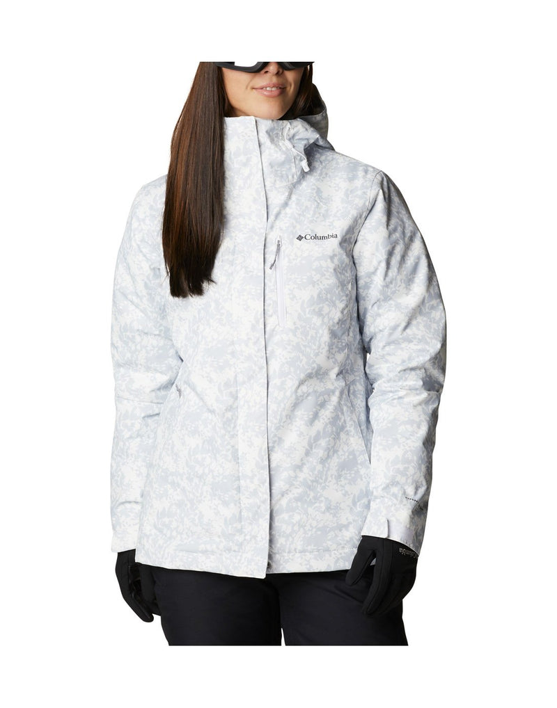 Woman wearing Columbia Women's Whirlibird™ IV Interchange Jacket in white florescence, zipped up, front view