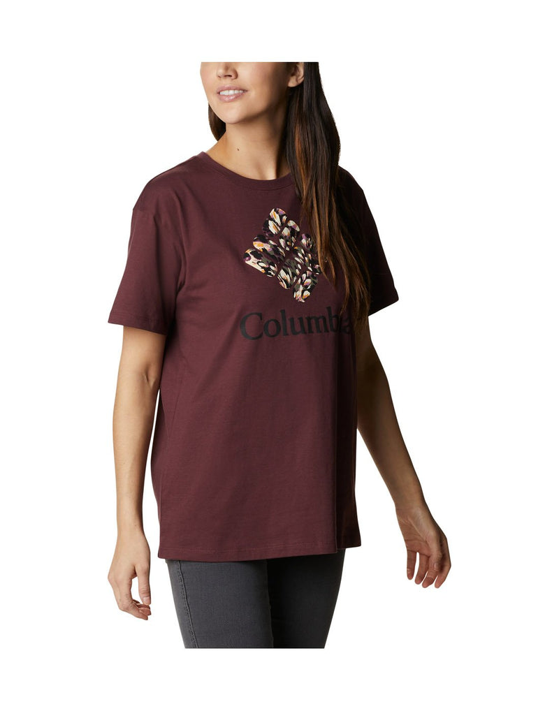Woman wearing Columbia Women's Columbia Park™ Relaxed Tee in malbec colour, angled front view