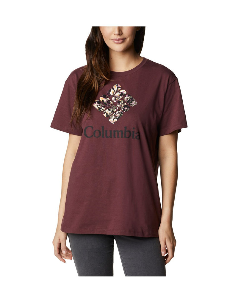 Woman wearing Columbia Women's Columbia Park™ Relaxed Tee in malbec colour with oversized Columbia logo, front view