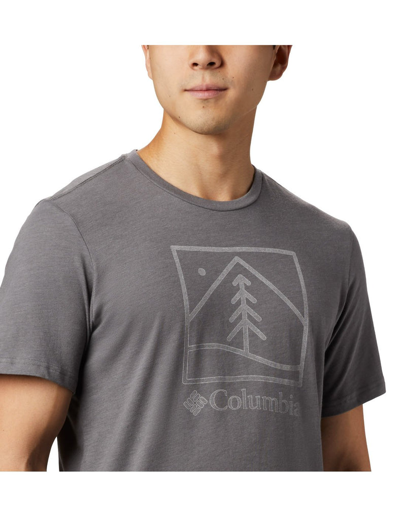 Close up of man wearing Columbia Men's Bluff Mesa™ Graphic T-Shirt in city grey