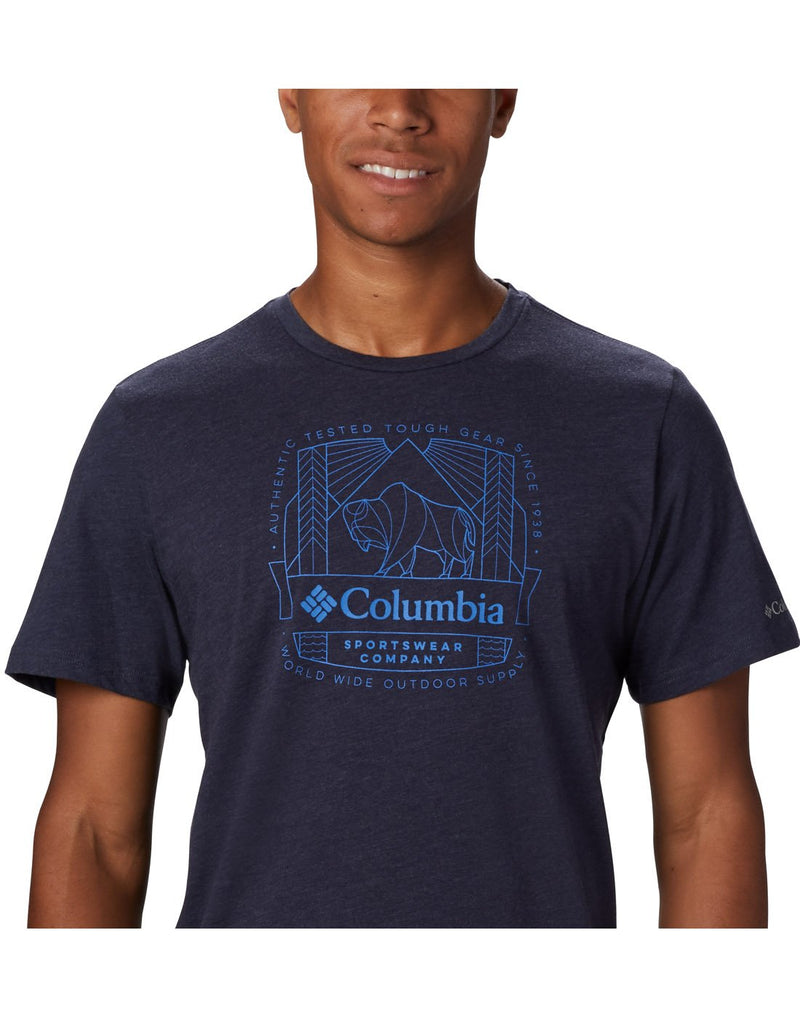 Close up of man wearing Columbia Men's Bluff Mesa™ Graphic T-Shirt in collegiate navy
