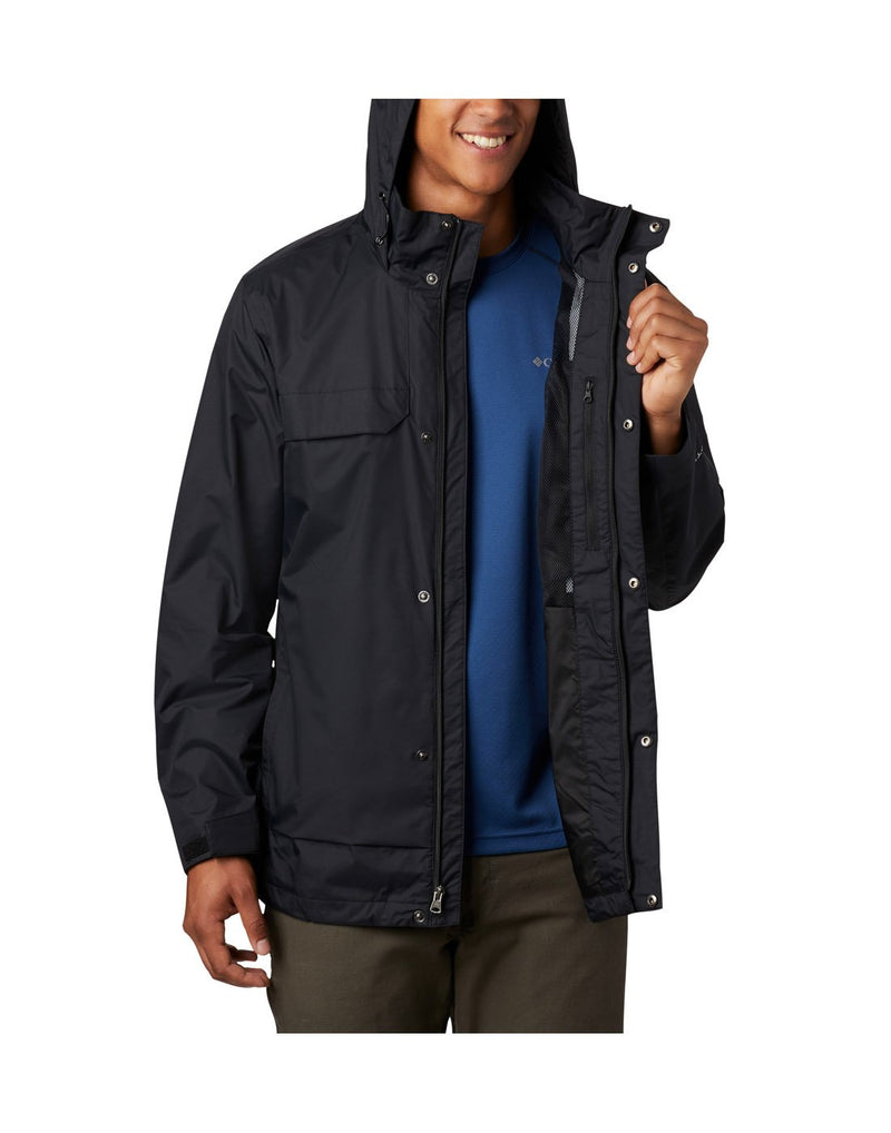 Model wearing Columbia Men's Tryon Trail™ Shell - black, front view, unzipped, half open showing interior