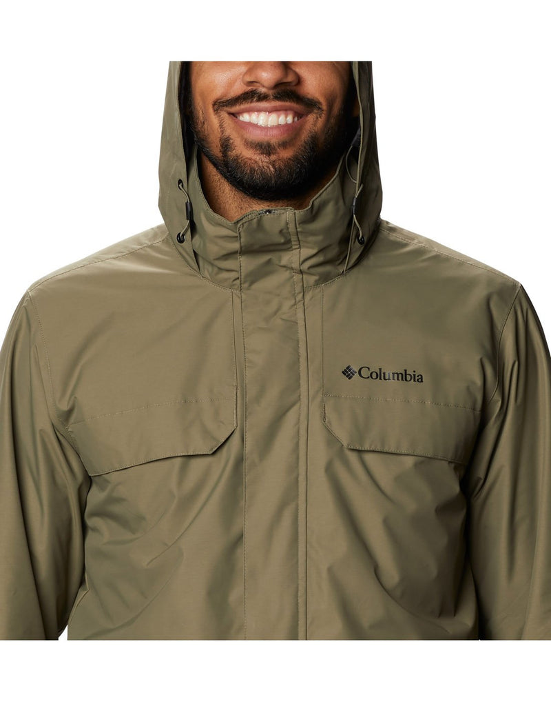 Model wearing Columbia Men's Tryon Trail™ Shell - stone green, close up of front with hood up