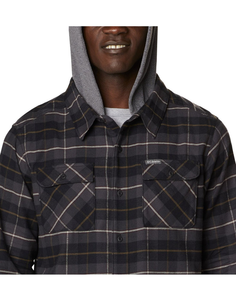 Close up of man wearing Columbia Men's Flare Gun™ Stretch Flannel Hoodie in black buffalo tartan, buttoned up and grey hood up