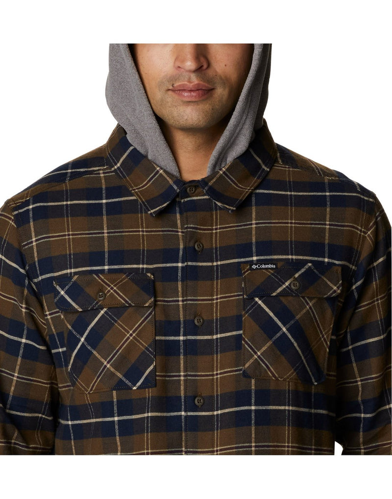 Close up of man wearing Columbia Men's Flare Gun™ Stretch Flannel Hoodie in olive green buffalo tartan, buttoned up and grey hood up