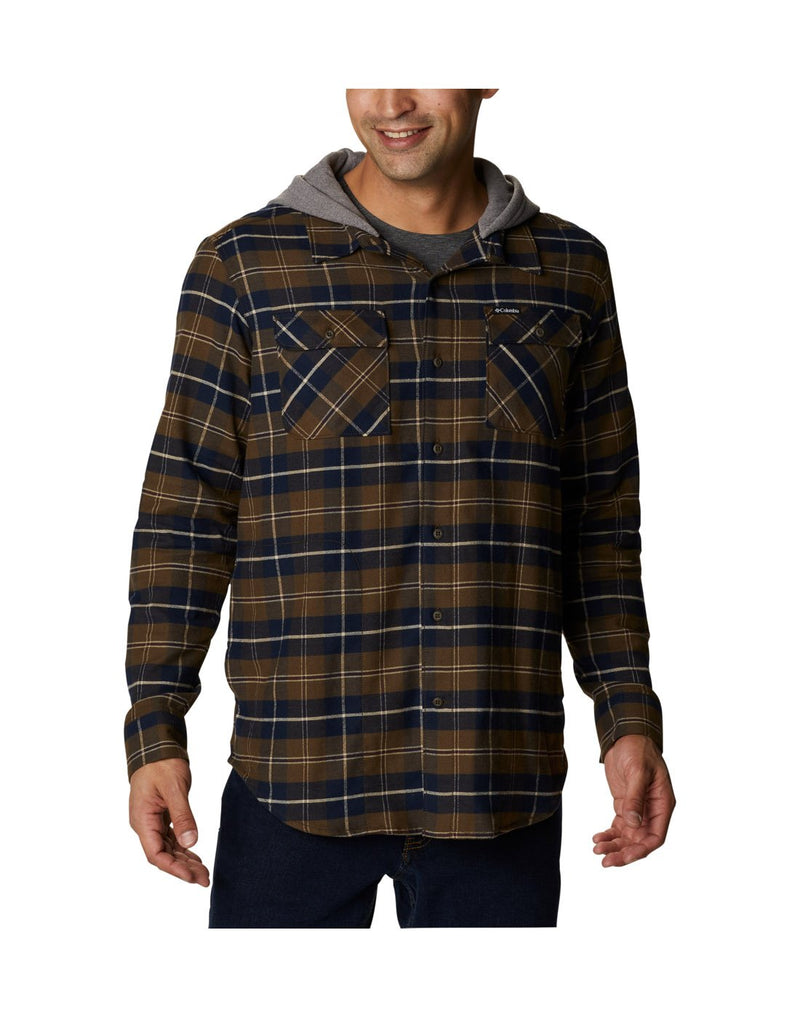 Man wearing Columbia Men's Flare Gun™ Stretch Flannel Hoodie in olive green buffalo tartan, buttoned up, front angled view