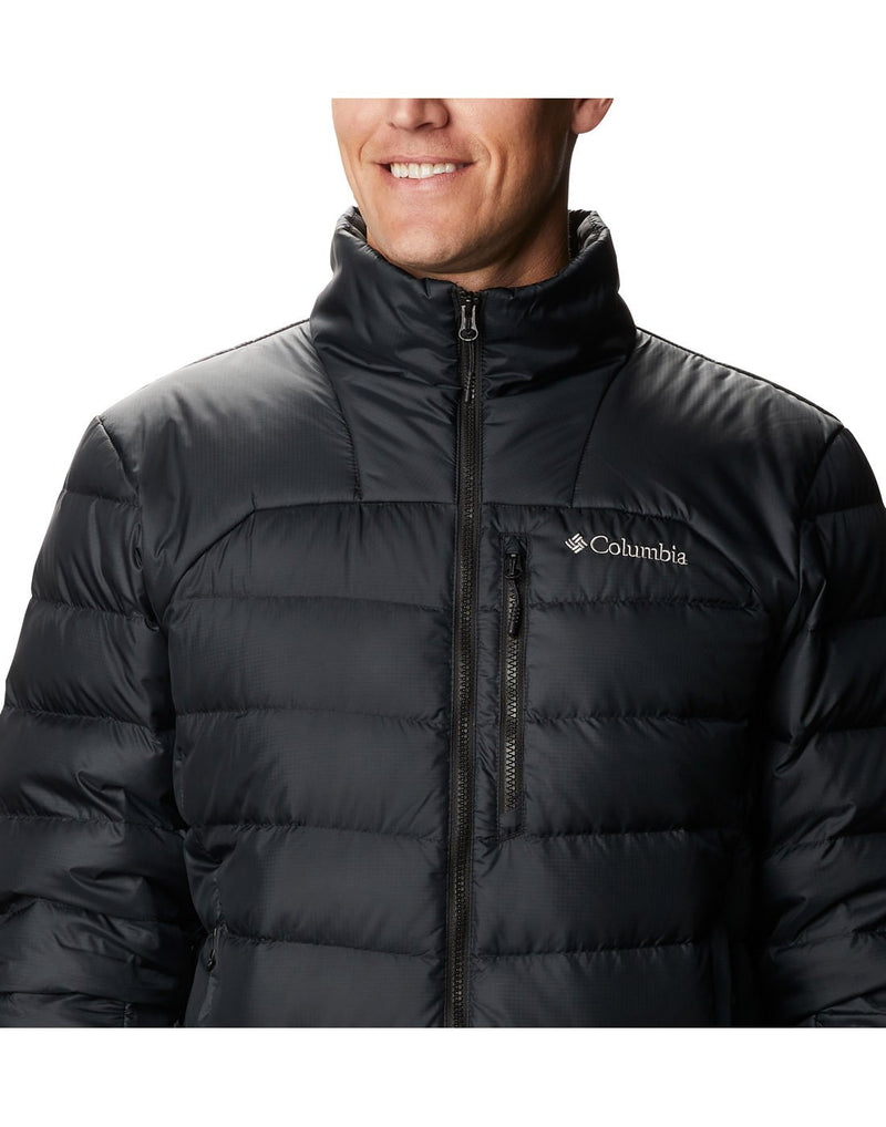 Close up of man wearing Columbia Men's Autumn Park™ Down Jacket in black, zipped up, front view