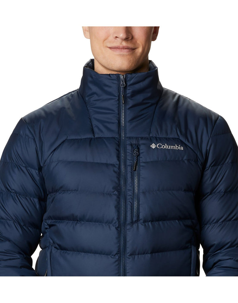 Close up of man wearing Columbia Men's Autumn Park™ Down Jacket in collegiate navy, zipped up, front view